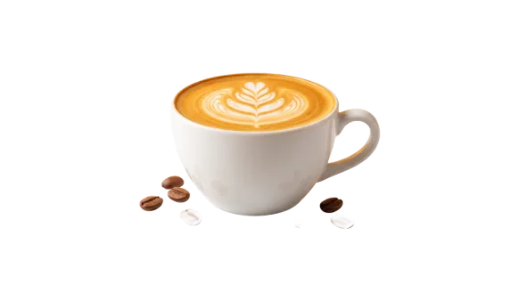 A white ceramic cup filled with a creamy latte, adorned with a delicate leaf pattern created by frothy milk, sits beside roasted coffee beans