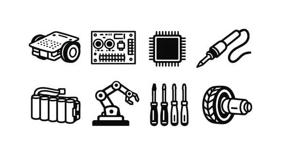 Miniature robotics lab: small robot chassis, circuit board with sensors, microcontroller chip, soldering iron, screwdriver set, battery pack, robotic arm, wheels with motors