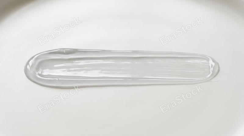 A straight horizontal light grey transparent gel smear with pure molecular clarity, smooth hydrated texture on a minimal background, clean scientific elegance, ultra-realistic, no logos.