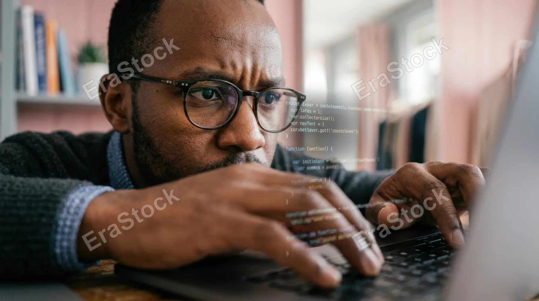 a close-up captures the 28-year-old east african male virtual assistant deeply focused on his laptop screen as he troubleshoots software solutions, his expression