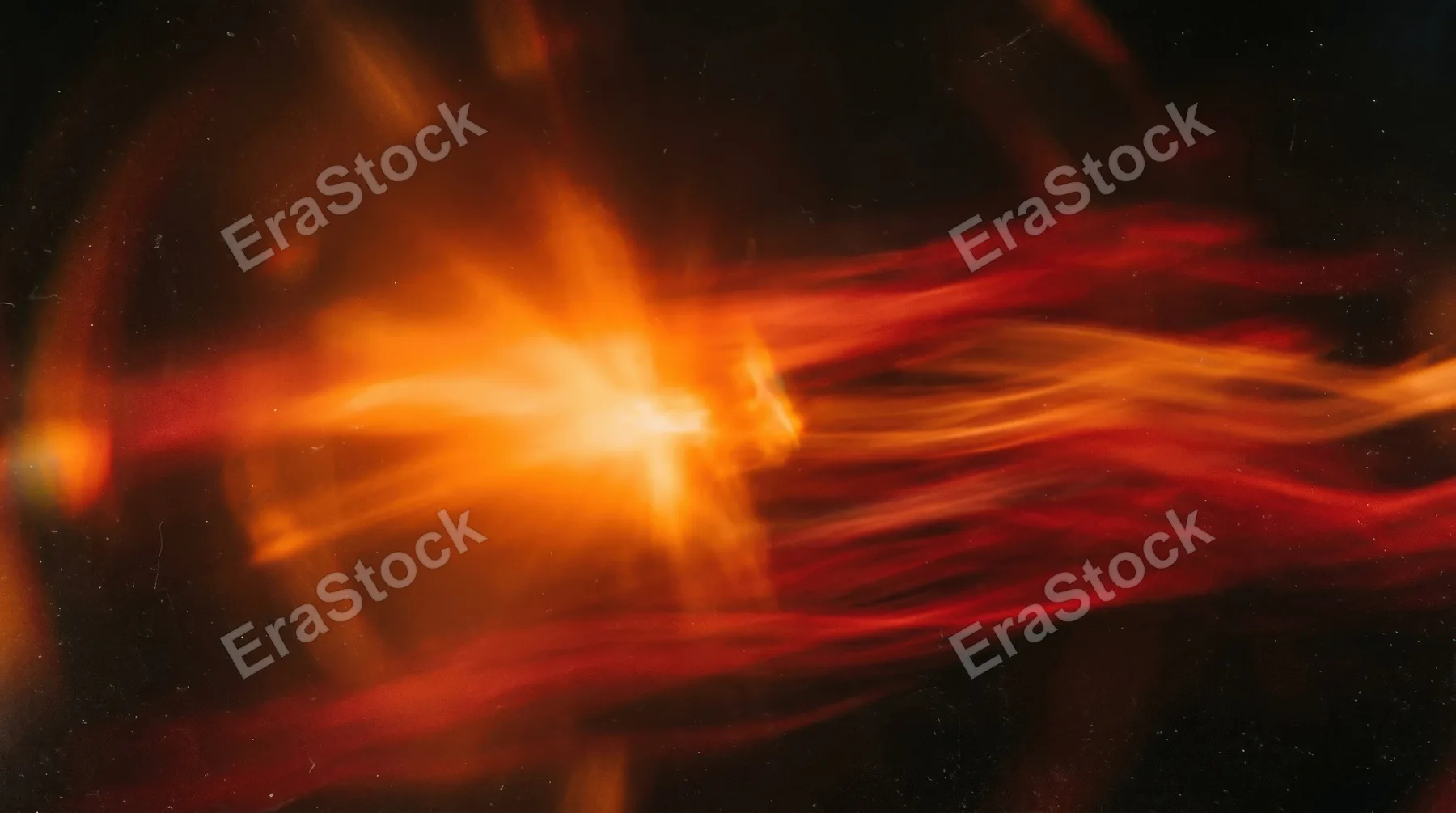 Abstract orange light flare on transparency, red-toned motion blur and soft retro lens haze creating warm energy, ultra-realistic, no logos.