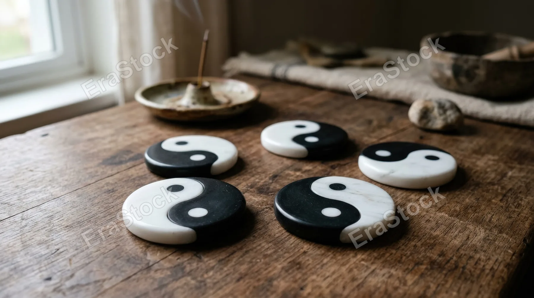 A set of yin and yang symbols in black and white, smooth circular balance, calm spiritual atmosphere, ultra-realistic, no logos.