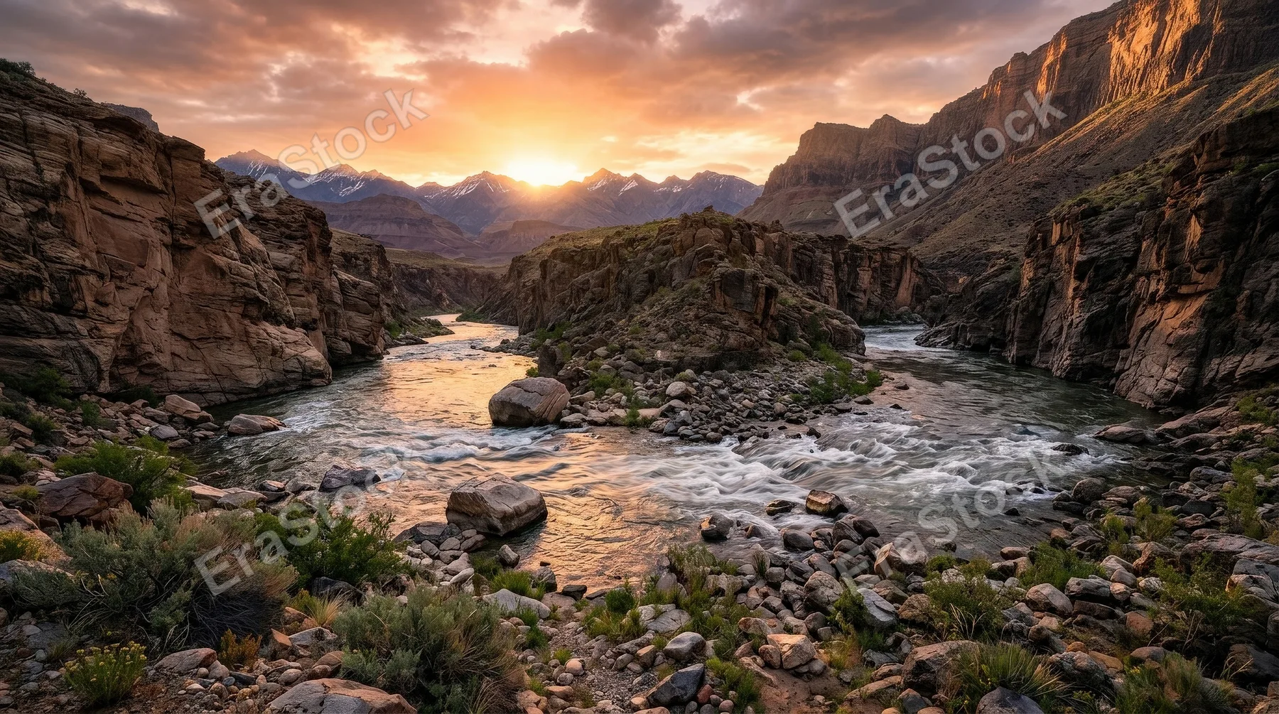 A beautiful mountain river landscape with canyon walls and low sun at dawn, glowing sky, flowing water and dramatic natural grandeur, ultra-realistic, no logos.