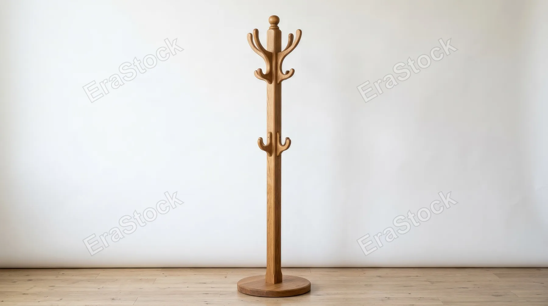 A wooden coat rack standing upright with multiple hooks, clean craftsmanship, warm natural grain, simple white backdrop, minimal studio atmosphere, ultra-realistic, no logos.
