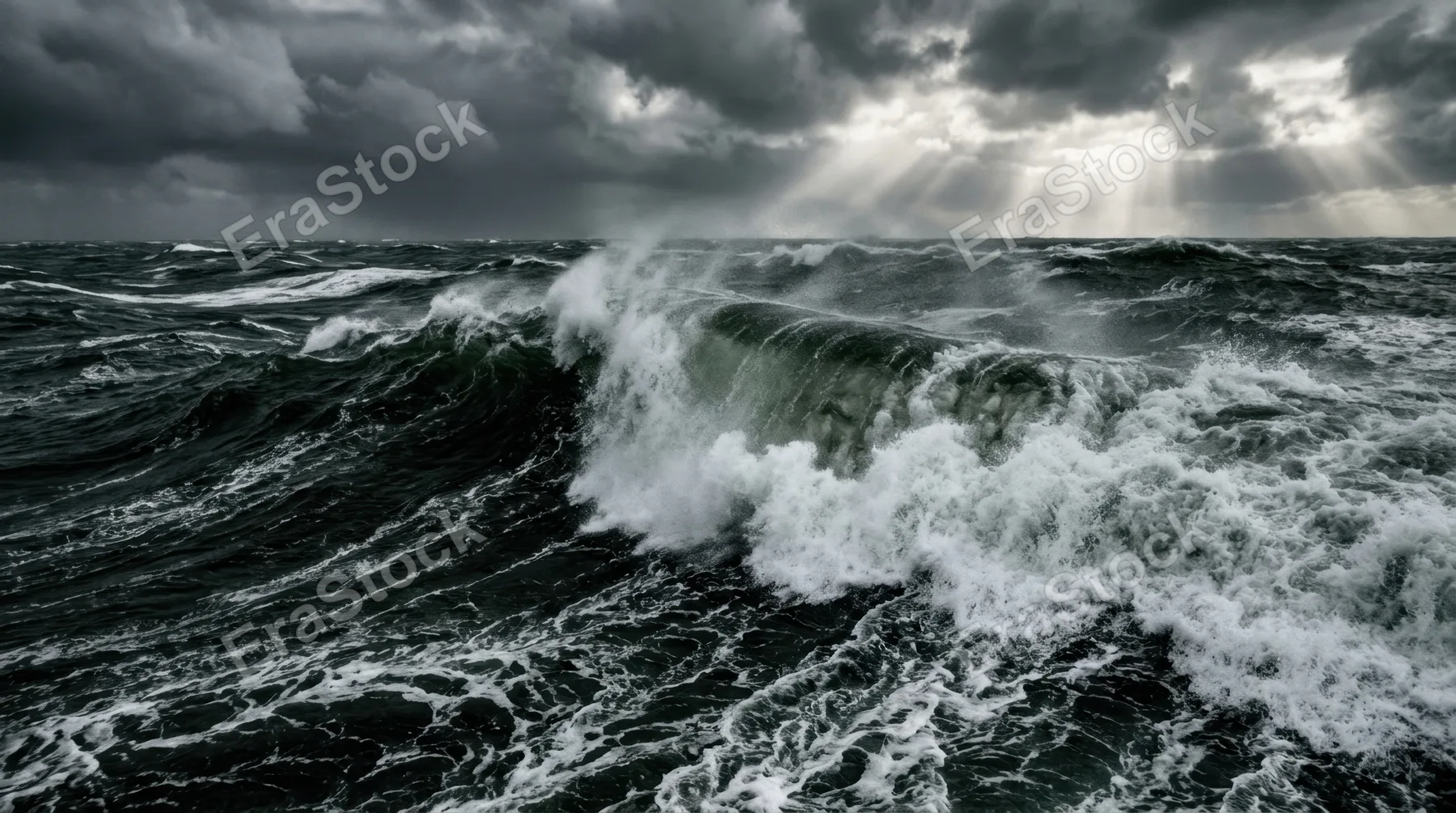 Stormy ocean surface viewed from sea level, massive dark green waves cresting and breaking in slow-motion fury, white foam trails racing across the water, dramatic storm