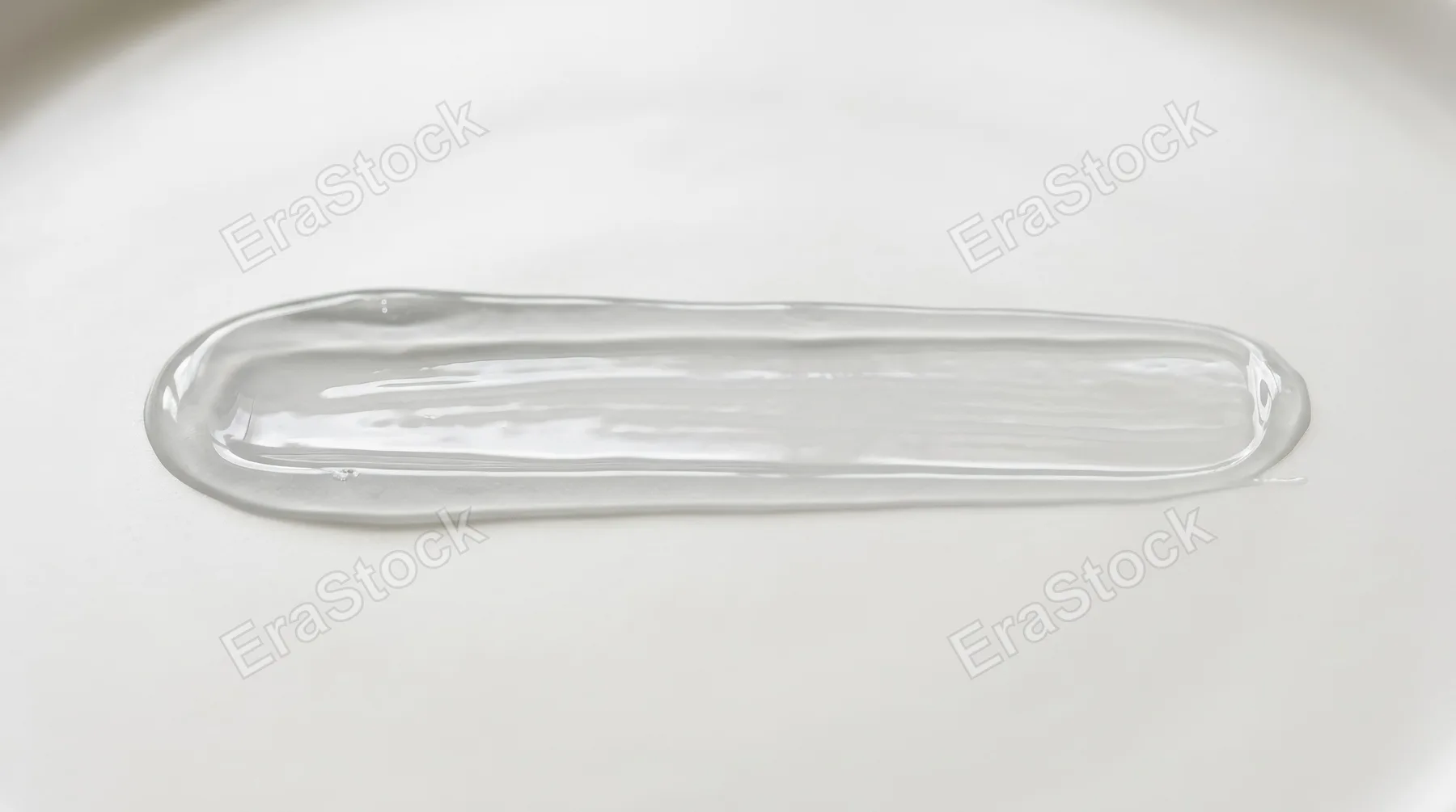 A straight horizontal light grey transparent gel smear with pure molecular clarity, smooth hydrated texture on a minimal background, clean scientific elegance, ultra-realistic, no logos.
