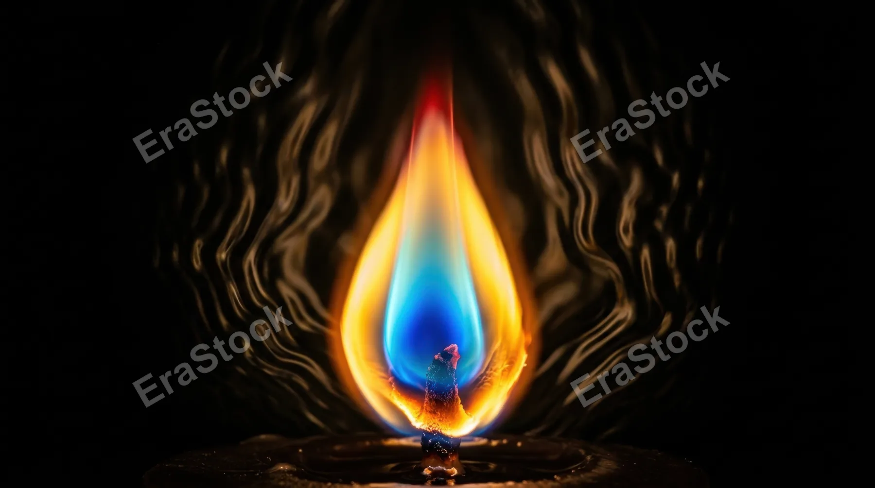 Extreme close-up of a single candle flame at peak burn, the teardrop shaped flame rendered in extraordinary thermal detail, innermost core a deep electric blue where