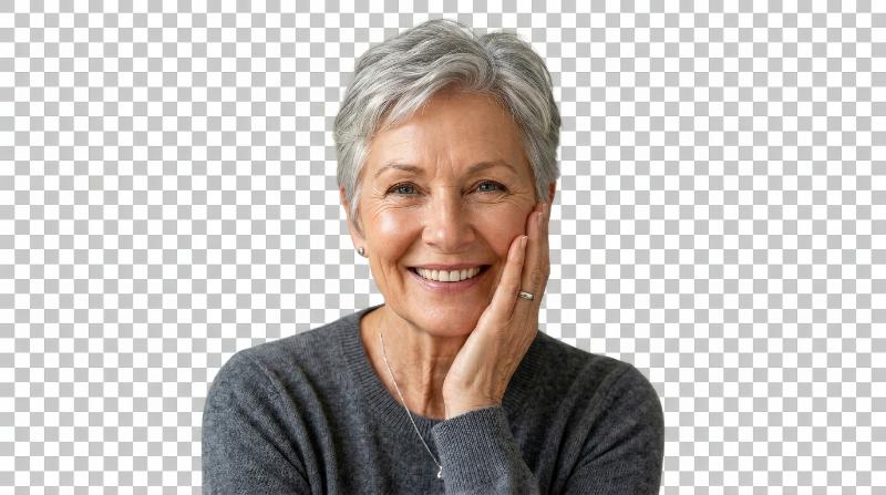 A senior woman with short gray hair touching her face and smiling confidently, glowing healthy skin, isolated on transparent background, soft beauty lighting and elegant simplicity, ultra-realistic,