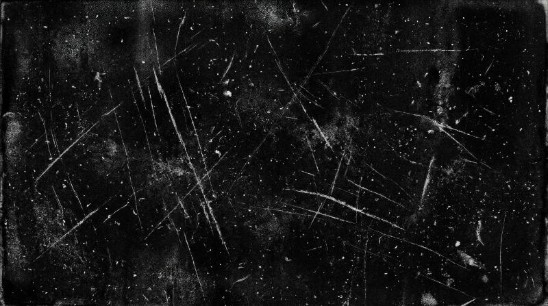 Grunge dust and scratch overlay on a black background, noisy film grain and distressed old-photo texture with worn imperfections, raw vintage darkness, ultra-realistic, no logos.
