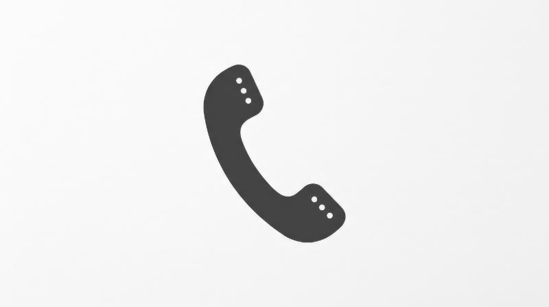 A flat phone icon isolated on white, smooth handset form, simple communication mood, ultra-realistic, no logos.